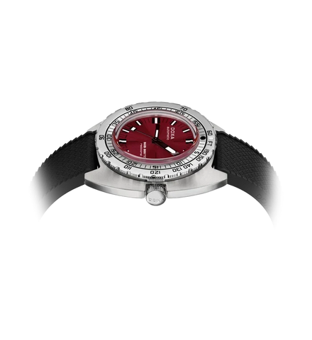 A wristwatch with a silver-toned case, a deep red dial, and a black textured strap, shown on a plain white background with a soft glow effect.
