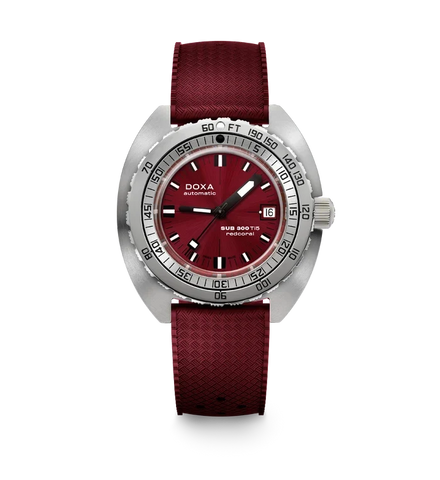 A DOXA Sub 300 TIT automatic watch featuring a deep red dial and a matching textured red strap, set against a clean white background.