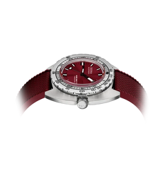 A wristwatch with a silver-toned case, a deep red dial, and a matching red textured strap, shown on a plain white background.