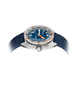 A wristwatch with a silver-toned stainless steel case, a blue dial, orange accents on the bezel and hands, and a textured blue strap, shown on a plain white background.