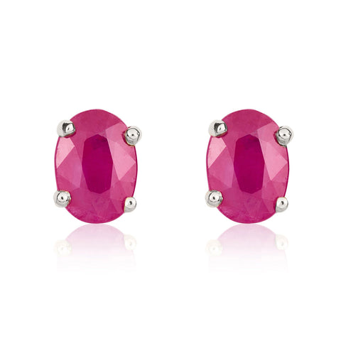 9ct White Gold Ruby 7x5mm Oval Claw Set Stud Earrings. 33-23-058.