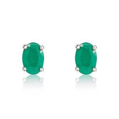 9ct White Gold Emerald 6x4mm Oval Claw Set Stud Earrings. 33-22-002.
