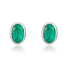 9ct White Gold Emerald 6x4mm Oval Rub Over Set Stud Earrings 33-22-066.