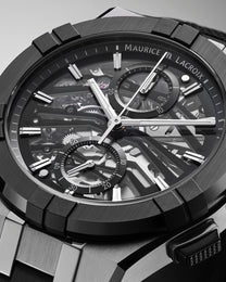 Maurice Lacroix watch with detailed mechanical components on a gray background