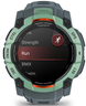 Garmin smartwatch with a green and gray exterior on a white background