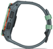Smartwatch with a green band on a white background