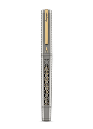 A luxury fountain pen shown vertically against a solid white background. The pen features a silver-toned metal body with intricate cutout patterns and a gold-toned clip, trim, and barrel top.