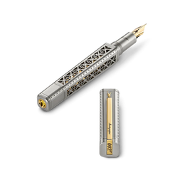 A silver-toned fountain pen with an Eiffel Tower-inspired geometric cutout design on the barrel, shown alongside its cap. The pen features a gold nib and gold accents, including a gold-plate clip on the cap.
