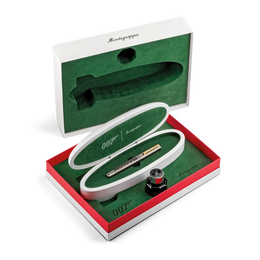 Montblanc 007 fountain pen gift set shown open, with the pen inside a white and red presentation box on a clean white background. The set includes a Montblanc signature pen, a compass, and branded packaging with green interior lining.