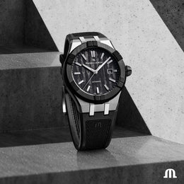 Maurice Lacroix watch on a concrete surface with geometric shadows