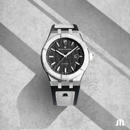 Maurice Lacroix watch on a textured surface