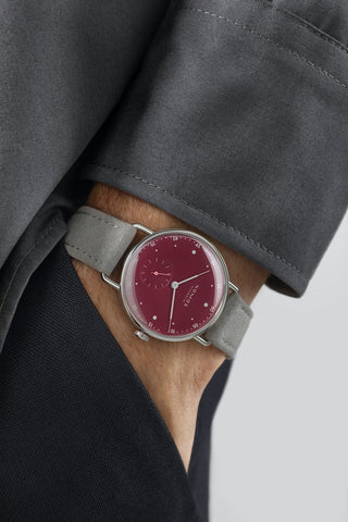 Nomos Glashutte Metro 33 Muted Red Steel Back Watch
