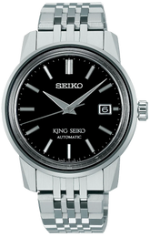 Seiko watch with black dial and silver metal bracelet on a white background