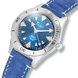 Wristwatch with blue face and strap on a transparent background