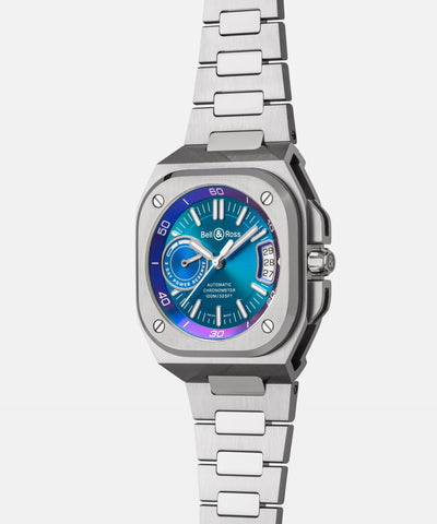 Silver watch with a blue face on a white background