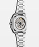 Silver watch with a detailed mechanical movement on a white background