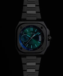 Black watch with a green and blue face on a black background