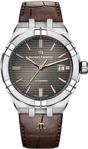 Maurice Lacroix watch with brown leather strap and silver case on white background