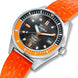 Watch with orange strap and black dial on a white background
