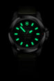 Black watch with green glowing face on a black background