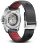 Watch with black strap and red interior, featuring a brand logo.