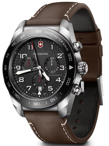Victorinox watch with brown leather strap and black dial on a white background