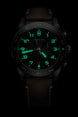 Black watch with green digital display on a black background