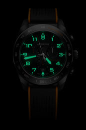 Watch with green digital display on a black background