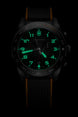 Watch with green digital display on a black background
