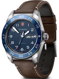 Victorinox watch with brown leather strap and blue dial on a white background