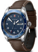 Victorinox watch with brown leather strap and blue dial on a white background