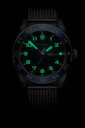Black watch with green digital display on a black background