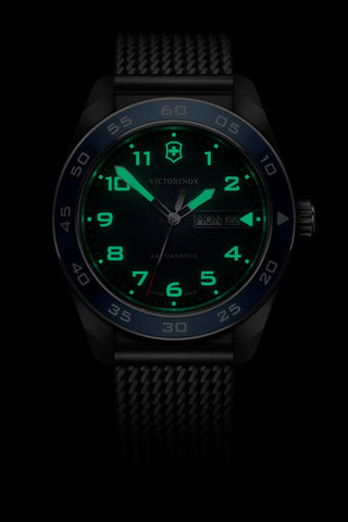 Black watch with green digital display on a black background