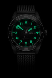 Black watch with green digital display on a black background