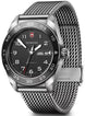 Victorinox watch with black dial and silver mesh band on a white background