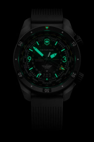 Black watch with green glowing face on a black background