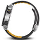Close-up of a watch with black and yellow band on a white background