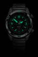 Black watch with green glowing face on a black background