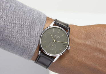 Nomos Glashutte Orion Neomatik 41 Date Olive Gold Sapphire Crystal