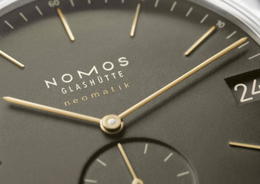 Nomos Glashutte Orion Neomatik 41 Date Olive Gold Sapphire Crystal