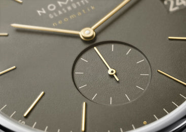 Nomos Glashutte Orion Neomatik 41 Date Olive Gold Sapphire Crystal