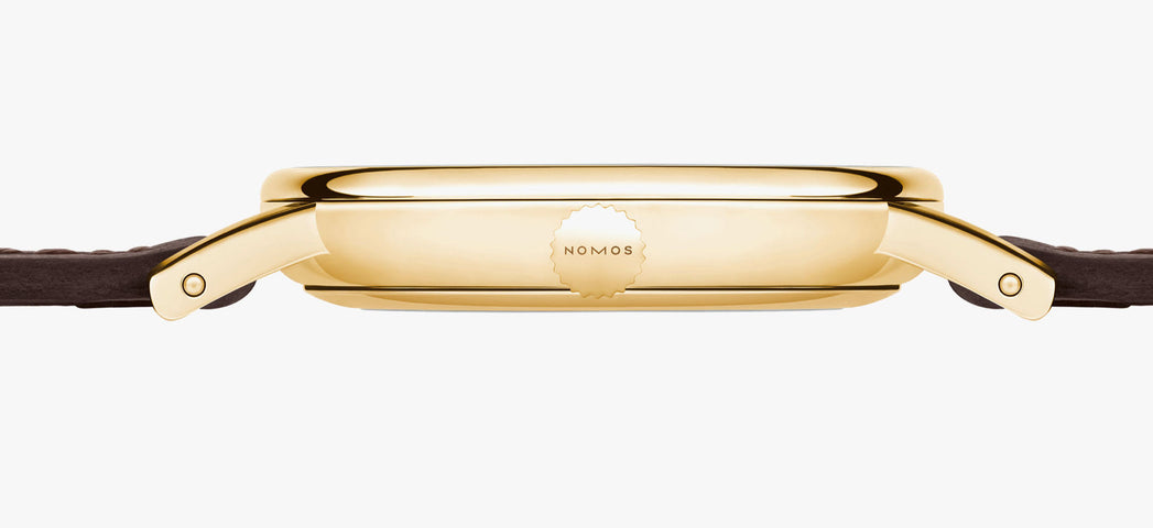 Nomos Glashutte Ludwig 33 Gold Sapphire Crystal Watch