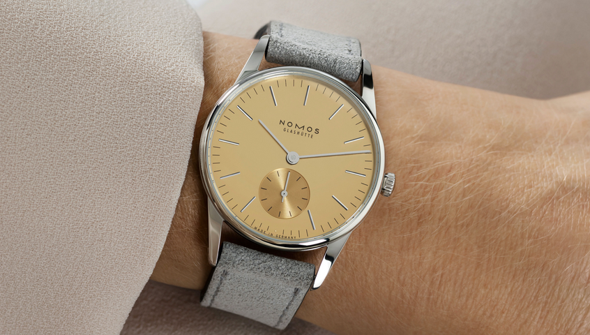 Nomos Glashutte Orion 33 Gold Steel Back Watch