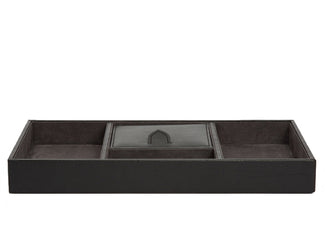 The Blake valet tray, in leather, incorporates a classic gentlemans office or bedroom necessity with a bit of flair. Includes grey ultrasuede lining and 4 storage compartments.